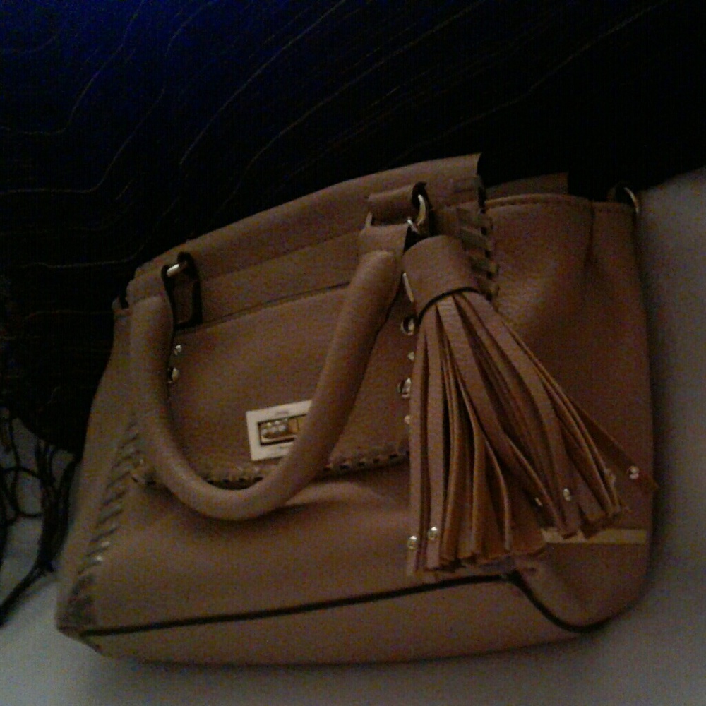 Tan colored purse.